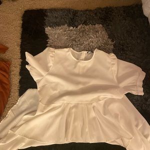 Shoulder’s have a little puff, Shorter in the front and the back